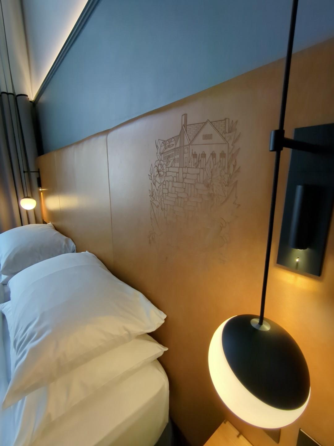 Handcrafted wall artwork inside a London hotel room