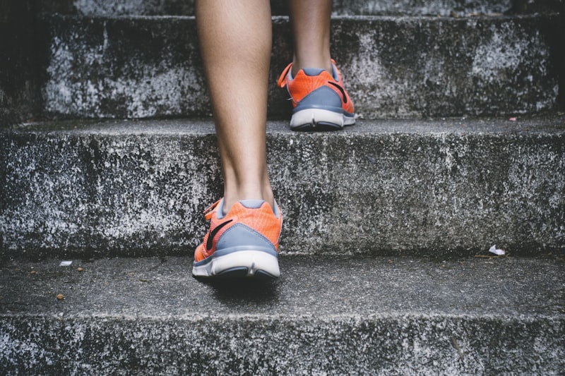 Athlete running outdoors with wearable tracking