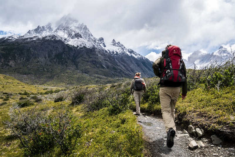 Hiker using navigation and safety wearables outdoors